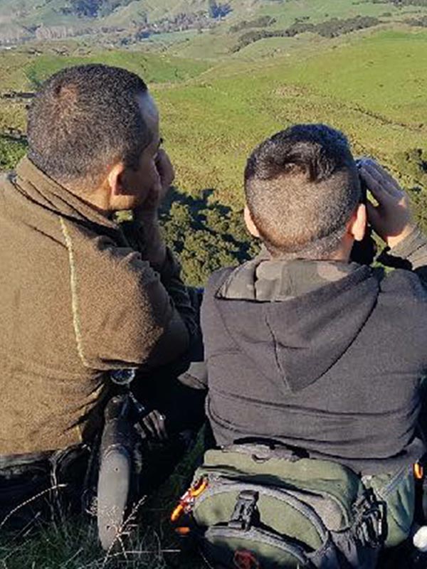 Dad and son hunting in Ūawa, Tolaga Bay East Coast